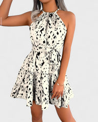 Nadine | Robe trapèze à imprimé léopard et col noué